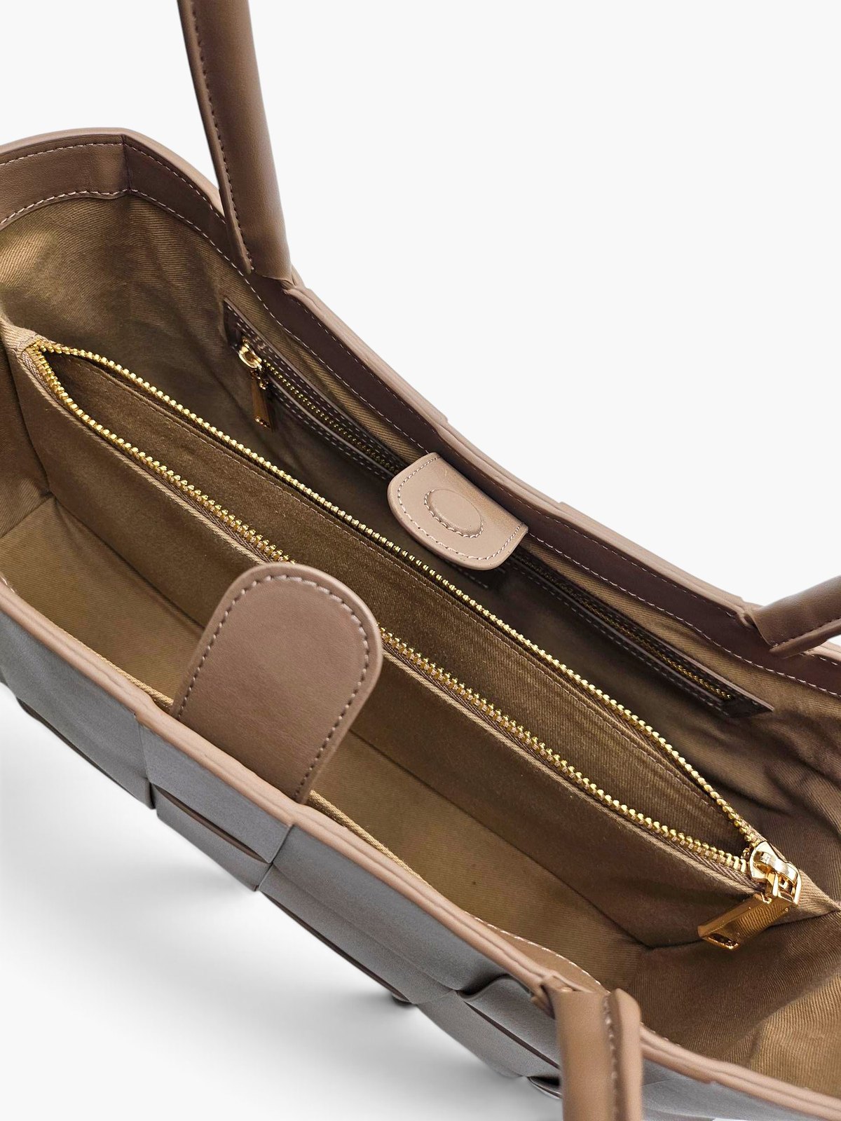 The.KTP opened to show its cotton lining and zipped middle compartment
